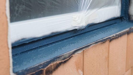 6. Pre-spray the sub-sill flashing